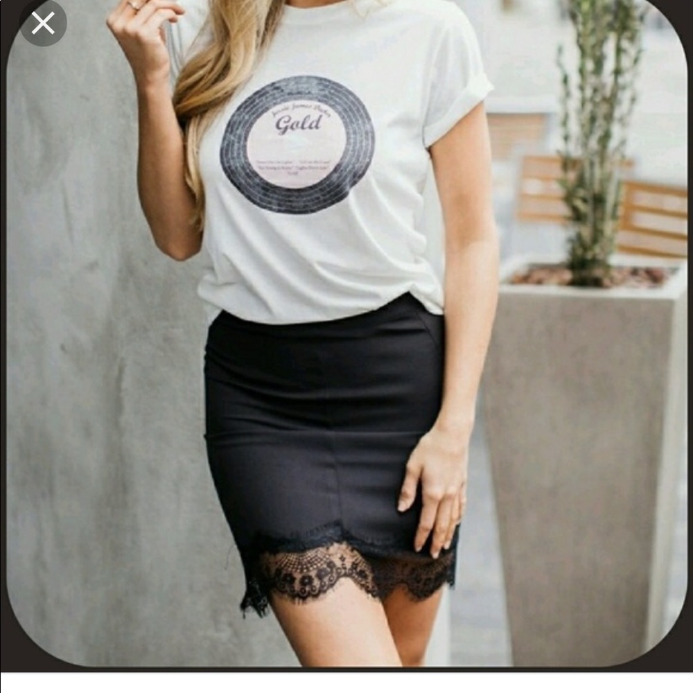 Black KITTENISH mini skirt by Jesse James decker